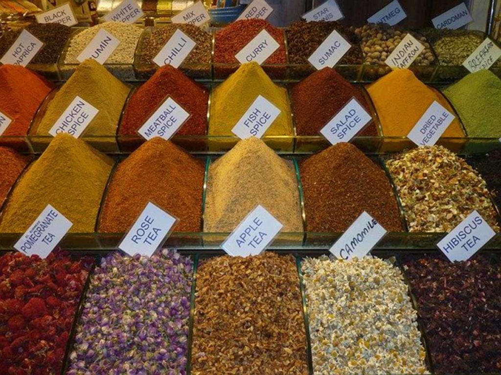 Colorful spices at a market. Microdosing ayahuasca dieta and contraindications.